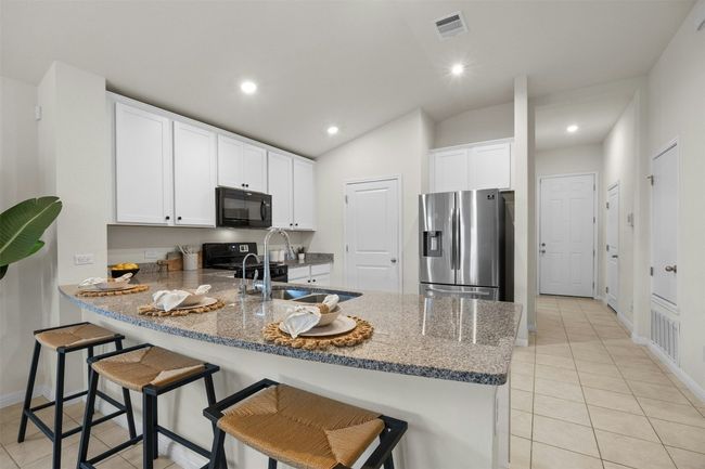 Kitchen looking towards front door | Image 22