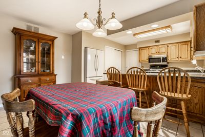 Eat at a table or the breakfast bar. Plenty of room for friends and family. | Image 3