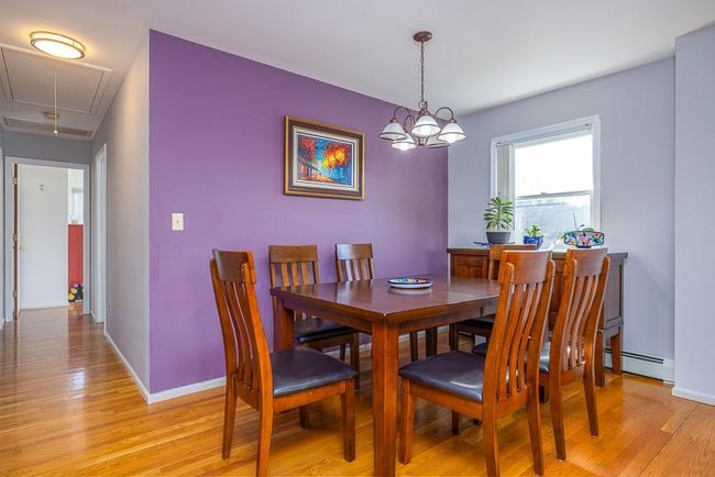 Open Dining Room with baseboards, attic access, and hardwood flooring | Image 7