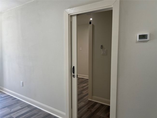 Sliding door from living room, kitchen to the bedroom in guest house | Image 35