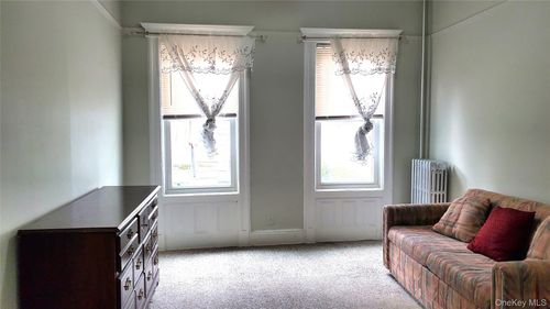 1-8602 89th Street, New York, NY, 11421 | Card Image