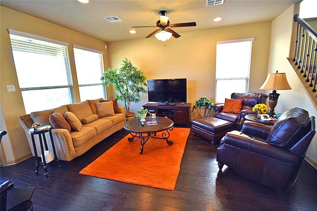 family room with ceiling fan | Image 4
