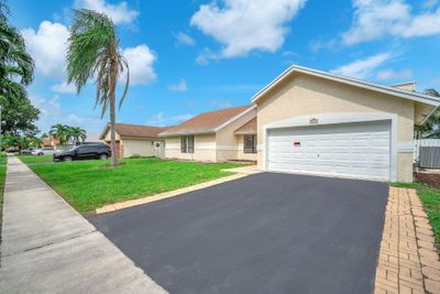 8311 Nw 51st Ct, House other with 4 bedrooms, 2 bathrooms and null parking in Lauderhill FL | Image 2