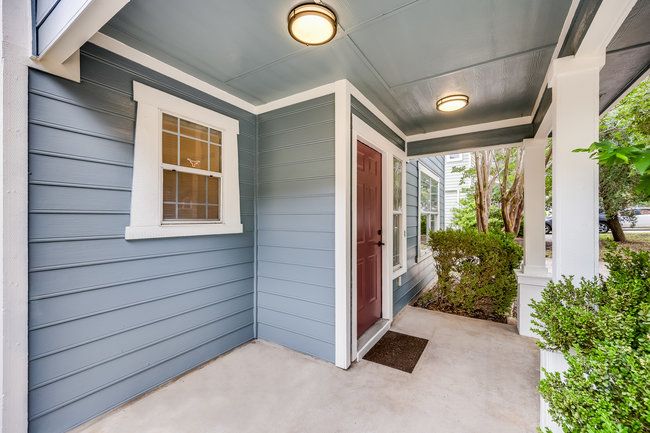 Entrance to property featuring a porch | Image 5