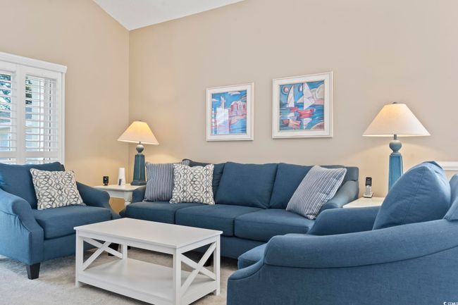 Living room with light colored carpet | Image 16