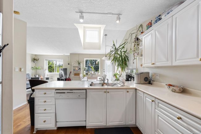 UP STAIRS ON MAIN FLOOR KITCHEN FACING EAST | Image 5