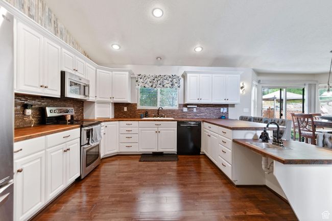 Kitchen features Granite Countertops and plenty of counter space. | Image 7