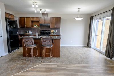 8550 103 Ave, Home with 3 bedrooms, 1 bathrooms and 2 parking in Grande Prairie AB | Image 2