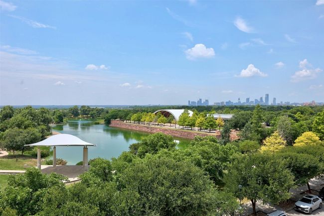 Aerial view of a large body of water and city skyline | Image 33