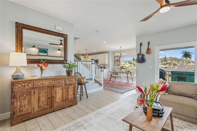 Living area on main level with convenient covered lanai. | Image 1