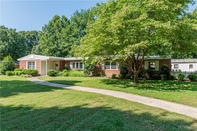 Single story home featuring a front lawn | Image 2