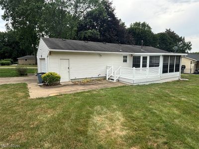 Rear view of property with a yard | Image 3