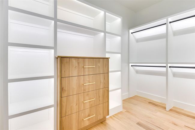 Spacious closet featuring hardwood / wood-style floors | Image 27