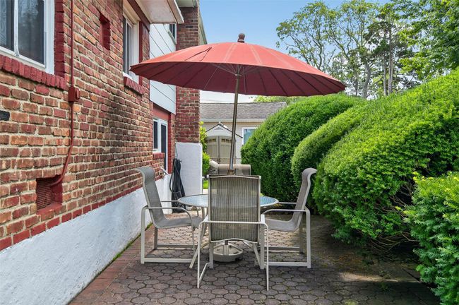 View of patio with outdoor dining space | Image 13