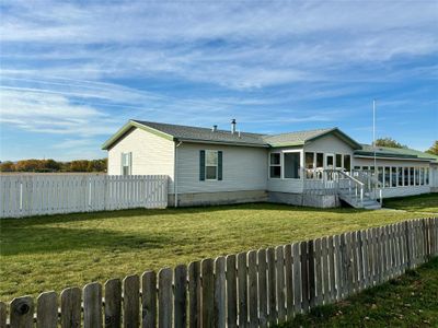 Rear view of property with a yard | Image 3