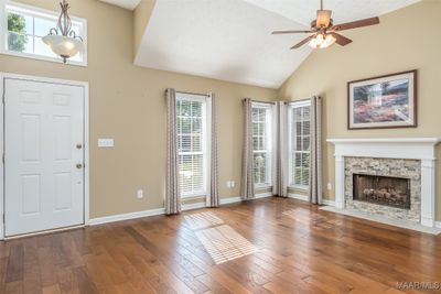 Natural light throughout the home and beautiful hardwood floors. | Image 3