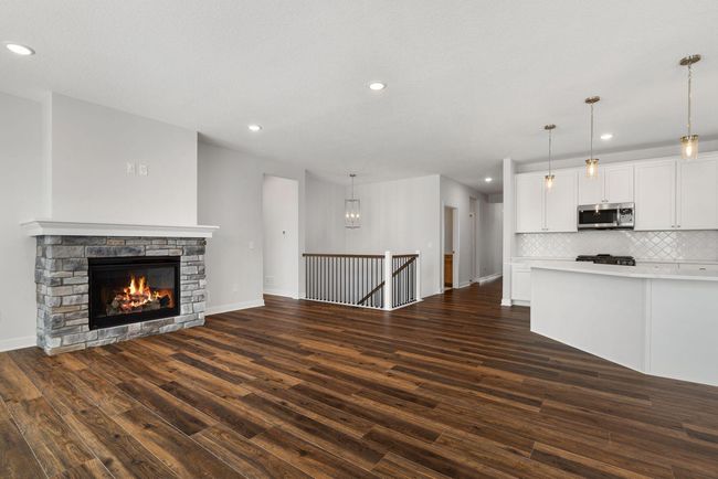 Enjoy a seamless flow from the great room into the adjacent dining and kitchen, creating an open and inviting space perfect for both everyday living and entertaining. | Image 10