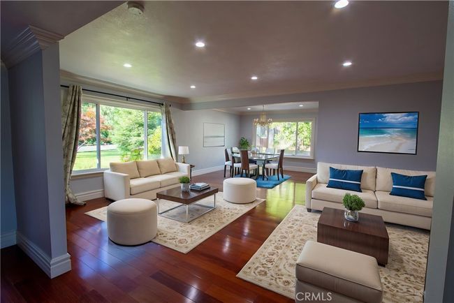 formal living room and dining area- virtually staged | Image 4