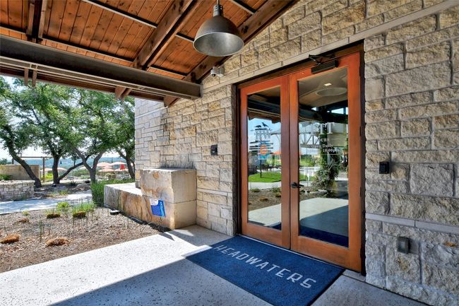 Entrance to property featuring stone siding and french doors | Image 35