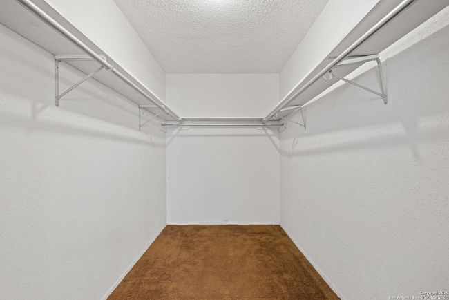 Primary Bedroom Walk-in Closet | Image 21