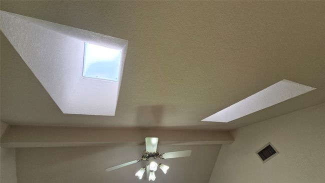 Detailed view of a skylight. This lights up the living room so well! | Image 5
