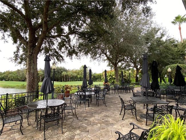 View of patio / terrace with a water view | Image 25