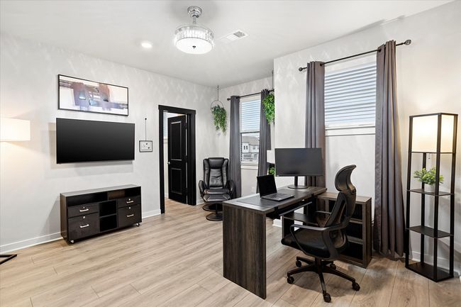Office featuring light wood finished floors and baseboards | Image 19