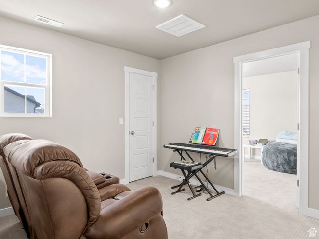Sitting room featuring light carpet and recessed lighting | Image 18