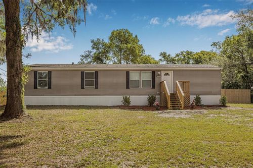 7706 23rd St, ZEPHYRHILLS, FL, 33540-1910 | Card Image