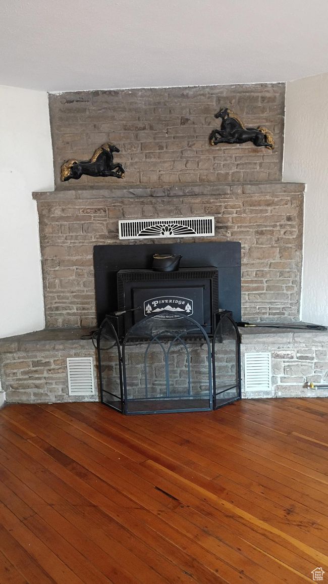 View of fireplace with woodstove insert. | Image 39