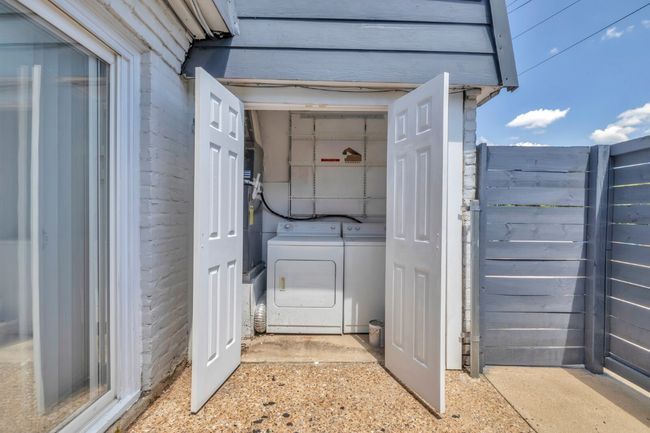 Laundry area featuring washer and dryer | Image 24
