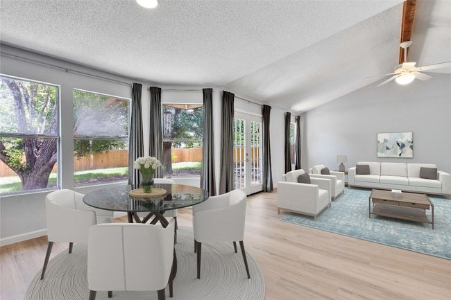 Dining area and family room, virtually staged. | Image 8
