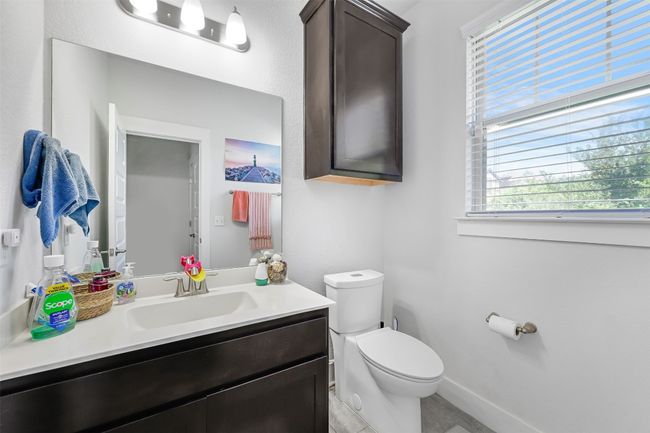 Bathroom with toilet and vanity | Image 24