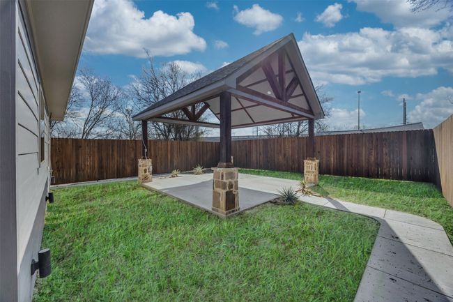 View of yard featuring a gazebo and a patio area | Image 27