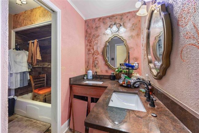 The downstairs guest bath. | Image 17