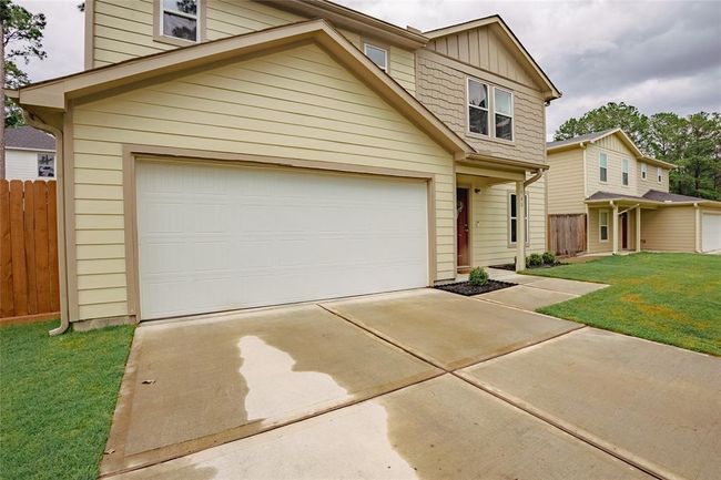 Close up view of the front of the home with pleasant color combination. | Image 35