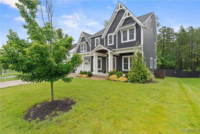 Craftsman-style house with board and batten siding | Image 42