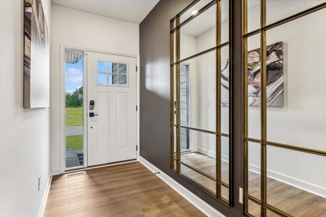 Photo is of the actual model. Make the best first impression with this bright and open foyer. | Image 8