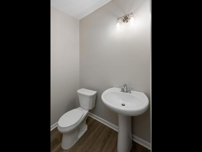 Main Floor Half Bath - Photo of similar home, finishes may vary, call list Agent with questions | Image 5