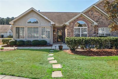 View of front facade with a front yard | Image 2