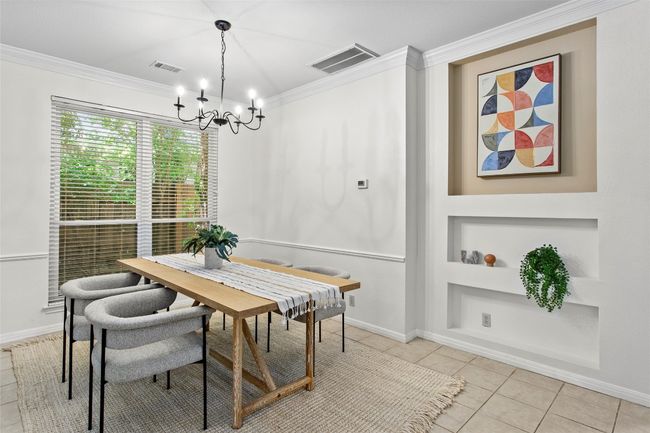 Formal dining space with niche wall accents | Image 13