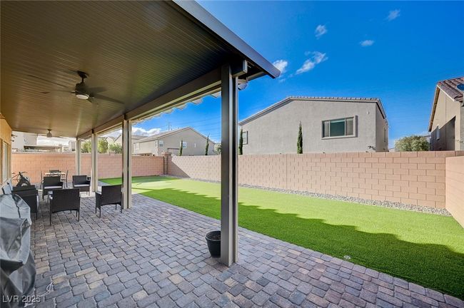 View of patio with Ceiling Fans featuring Pavers and Artificial Turf | Image 47