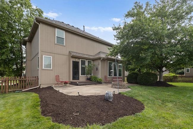 concrete patio w/firepit and nice landscape | Image 25