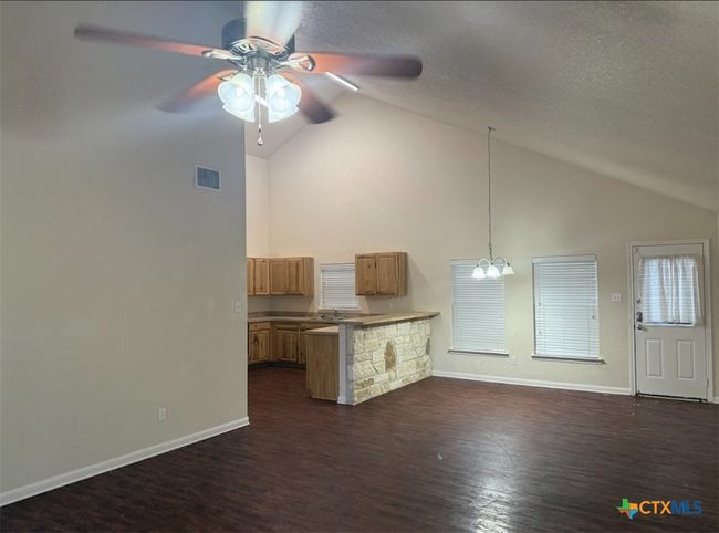 Front view of living room, to open area (dining, living and kitechen) | Image 8