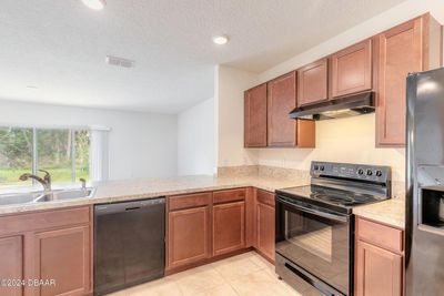 1631 Primo Court, Townhouse with 3 bedrooms, 2 bathrooms and null parking in Holly Hill FL | Image 2