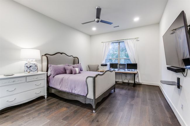 Owner's suite with a ceiling fan, baseboards, wood-style flooring and recessed lighting. Tons of space here and a window for natural light! | Image 14