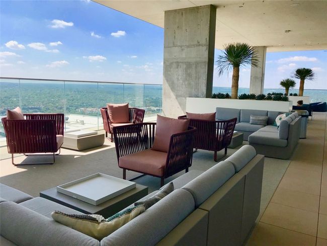 View of patio with an outdoor living space and a balcony | Image 32
