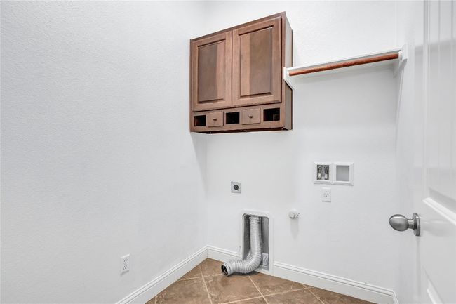 Laundry room featuring hookup for an electric dryer | Image 29