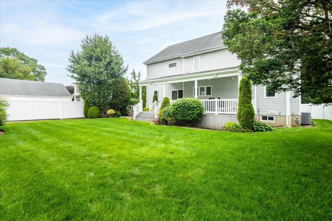 Back of property with covered porch | Image 36