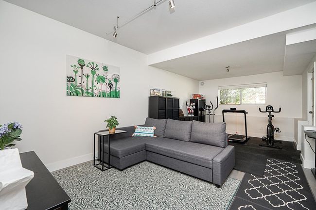 Living room featuring baseboards | Image 20